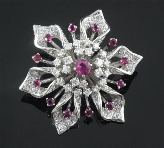 A platinum, ruby and diamond flowerhead brooch, 40mm.